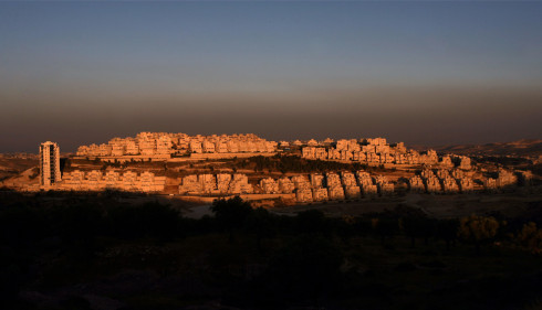 The Jewish settlement of Har Homa at sunset in east Jerusalem on June 3, 2009. (AHMAD GHARABLI/AFP/Getty Images) #